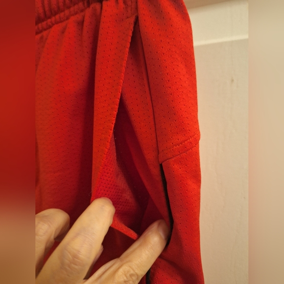 Under Armor red shorts. - Picture 2 of 6